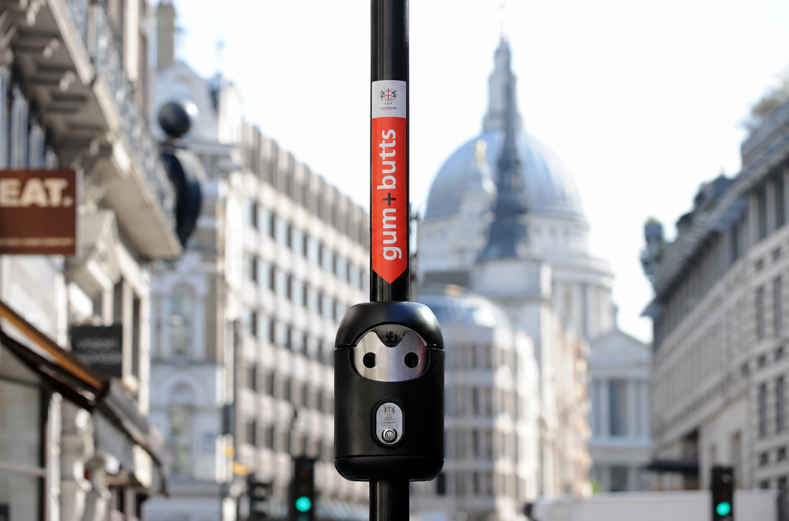 City of London Smartbin and gum-and-butts sign with St Paul’s Cathedral behind